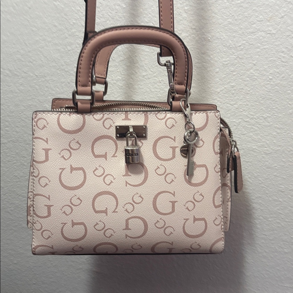 Pink Guess cross body bag/ hand bag